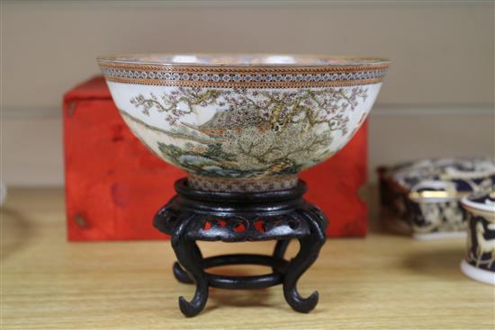 A Chinese egg shell porcelain bowl, wood stand and box